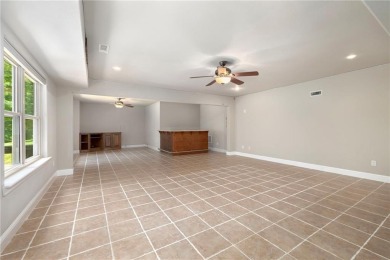 Tucked away in the cul-de-sac and spanning 2 lots, this stunning on Bella Vista - Metfield Golf Complex and Country Club in Arkansas - for sale on GolfHomes.com, golf home, golf lot