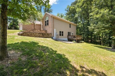 Tucked away in the cul-de-sac and spanning 2 lots, this stunning on Bella Vista - Metfield Golf Complex and Country Club in Arkansas - for sale on GolfHomes.com, golf home, golf lot