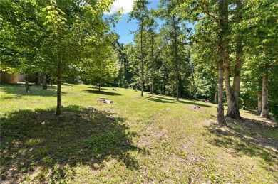 Tucked away in the cul-de-sac and spanning 2 lots, this stunning on Bella Vista - Metfield Golf Complex and Country Club in Arkansas - for sale on GolfHomes.com, golf home, golf lot