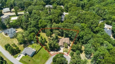Tucked away in the cul-de-sac and spanning 2 lots, this stunning on Bella Vista - Metfield Golf Complex and Country Club in Arkansas - for sale on GolfHomes.com, golf home, golf lot
