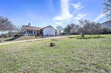 GORGEOUS LAKE LBJ VIEWS IN HIGHLY DESIREABLE DEER HAVEN on Apple Rock Golf Course - Horseshoe Bay in Texas - for sale on GolfHomes.com, golf home, golf lot