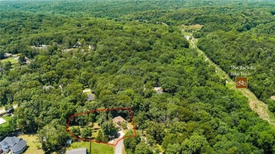 Tucked away in the cul-de-sac and spanning 2 lots, this stunning on Bella Vista - Metfield Golf Complex and Country Club in Arkansas - for sale on GolfHomes.com, golf home, golf lot