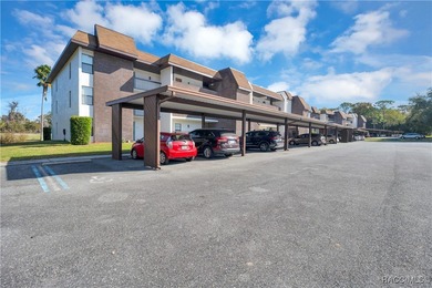 Spacious 2 bedroom 2 bath *end unit* condo with a `Spectacular` on Sugarmill Woods Golf and Country Club in Florida - for sale on GolfHomes.com, golf home, golf lot