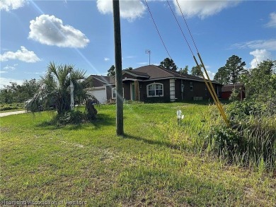 Build your dream home or invest in this vacant residential lot on Sun n Lake Golf and Country Club in Florida - for sale on GolfHomes.com, golf home, golf lot