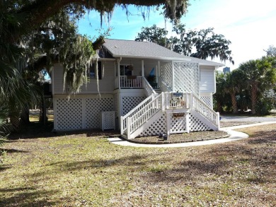 Recently updated custom home overlooking the golf course in on The Plantation Course At Edisto in South Carolina - for sale on GolfHomes.com, golf home, golf lot