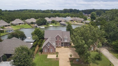 LIVE LIKE YOU'RE ON VACATION YEAR ROUND!! This Beautiful on Lake Caroline Golf Club in Mississippi - for sale on GolfHomes.com, golf home, golf lot