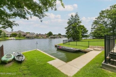 LIVE LIKE YOU'RE ON VACATION YEAR ROUND!! This Beautiful on Lake Caroline Golf Club in Mississippi - for sale on GolfHomes.com, golf home, golf lot