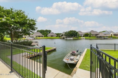 LIVE LIKE YOU'RE ON VACATION YEAR ROUND!! This Beautiful on Lake Caroline Golf Club in Mississippi - for sale on GolfHomes.com, golf home, golf lot