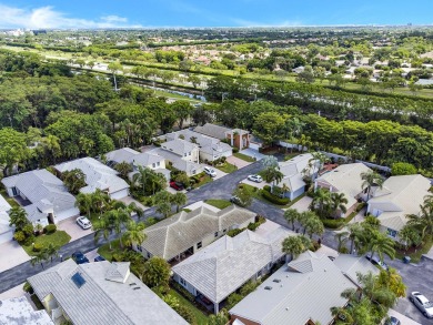 Located in Oxford Estates in posh Boca Raton, this small gated on Boca Lago Golf and Country Club in Florida - for sale on GolfHomes.com, golf home, golf lot