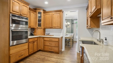 Welcome home to this beautiful brick residence in desirable on The Divide Golf Club in North Carolina - for sale on GolfHomes.com, golf home, golf lot