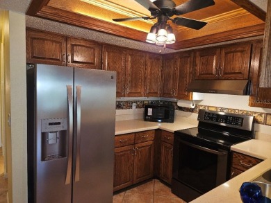 Squeaky clean and priced to sell!   Pet friendly and leasing is on Village Green Golf Club of Sarasota in Florida - for sale on GolfHomes.com, golf home, golf lot