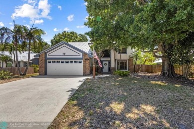 You'll love coming home to this hidden gem on Sailfish Sands on Martin County Golf Course in Florida - for sale on GolfHomes.com, golf home, golf lot