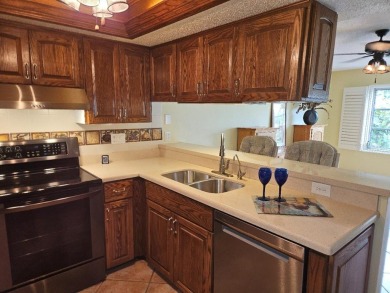 Squeaky clean and priced to sell!   Pet friendly and leasing is on Village Green Golf Club of Sarasota in Florida - for sale on GolfHomes.com, golf home, golf lot