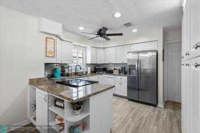 You'll love coming home to this hidden gem on Sailfish Sands on Martin County Golf Course in Florida - for sale on GolfHomes.com, golf home, golf lot