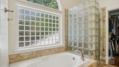Welcome home to this beautiful brick residence in desirable on The Divide Golf Club in North Carolina - for sale on GolfHomes.com, golf home, golf lot