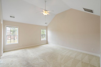 Welcome to 7788 Cypress Island Drive, a beautifully maintained on Masonboro Country Club in North Carolina - for sale on GolfHomes.com, golf home, golf lot