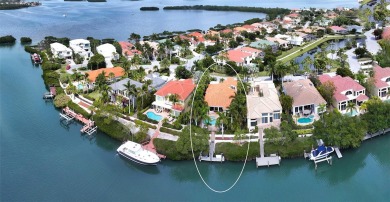 Delight in a lifestyle of tropical grandeur in this exquisite on Longboat Key Golf Club in Florida - for sale on GolfHomes.com, golf home, golf lot