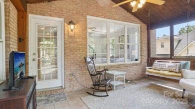 Welcome home to this beautiful brick residence in desirable on The Divide Golf Club in North Carolina - for sale on GolfHomes.com, golf home, golf lot