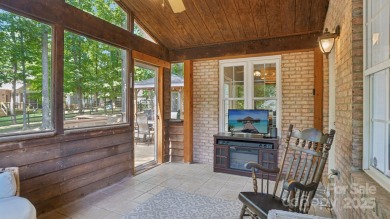 Welcome home to this beautiful brick residence in desirable on The Divide Golf Club in North Carolina - for sale on GolfHomes.com, golf home, golf lot