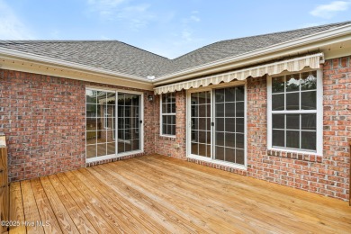 Welcome to 7788 Cypress Island Drive, a beautifully maintained on Masonboro Country Club in North Carolina - for sale on GolfHomes.com, golf home, golf lot