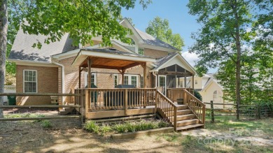 Welcome home to this beautiful brick residence in desirable on The Divide Golf Club in North Carolina - for sale on GolfHomes.com, golf home, golf lot