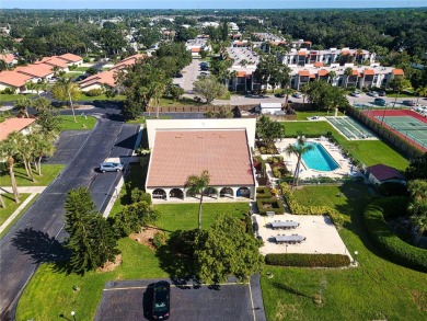 Squeaky clean and priced to sell!   Pet friendly and leasing is on Village Green Golf Club of Sarasota in Florida - for sale on GolfHomes.com, golf home, golf lot