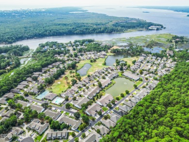 Welcome to 7788 Cypress Island Drive, a beautifully maintained on Masonboro Country Club in North Carolina - for sale on GolfHomes.com, golf home, golf lot