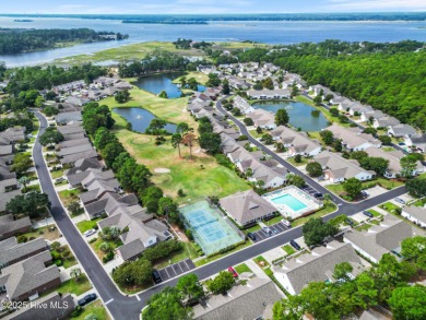Welcome to 7788 Cypress Island Drive, a beautifully maintained on Masonboro Country Club in North Carolina - for sale on GolfHomes.com, golf home, golf lot