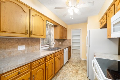 Great rental opportunity or permanent residence in this spacious on DeSoto Golf Course in Arkansas - for sale on GolfHomes.com, golf home, golf lot