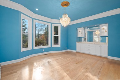 Situated overlooking one of Isabella Golf Course's scenic par 3s on Isabella Golf Course  in Arkansas - for sale on GolfHomes.com, golf home, golf lot