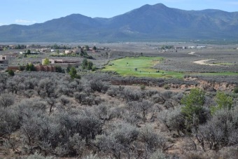 1.244 acre parcel located atop Mesa Encantada has unobstructed on Taos Country Club in New Mexico - for sale on GolfHomes.com, golf home, golf lot