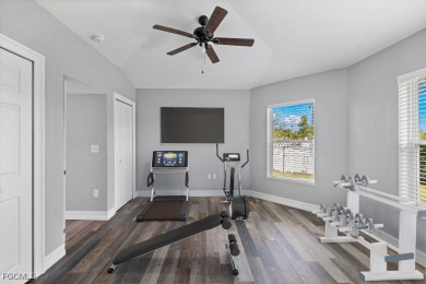 This is your chance to own a home in a non-HOA neighborhood west on Raptor Bay Golf Club in Florida - for sale on GolfHomes.com, golf home, golf lot