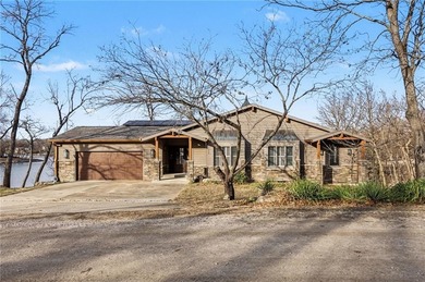 This lake front home in sought after Sugar Valley Lakes sits on on Sugar Valley Lakes Golf Course in Kansas - for sale on GolfHomes.com, golf home, golf lot