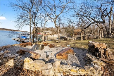 This lake front home in sought after Sugar Valley Lakes sits on on Sugar Valley Lakes Golf Course in Kansas - for sale on GolfHomes.com, golf home, golf lot