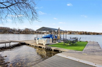 This lake front home in sought after Sugar Valley Lakes sits on on Sugar Valley Lakes Golf Course in Kansas - for sale on GolfHomes.com, golf home, golf lot