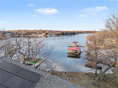 This lake front home in sought after Sugar Valley Lakes sits on on Sugar Valley Lakes Golf Course in Kansas - for sale on GolfHomes.com, golf home, golf lot