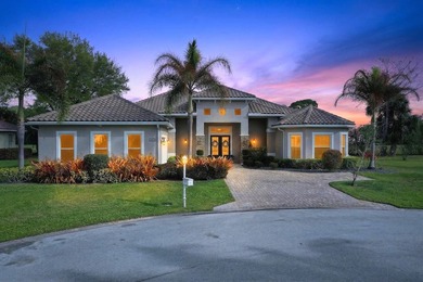 Stunning custom home located on a quiet cul-de-sac in the on St. Lucie Trail Golf Club in Florida - for sale on GolfHomes.com, golf home, golf lot