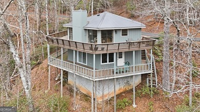 Spacious yet charming 2-story Octagon-style home in Sky Valley on Sky Valley Resort and Country Club in Georgia - for sale on GolfHomes.com, golf home, golf lot