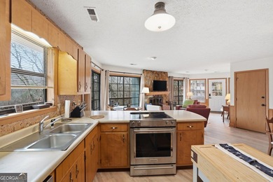 Spacious yet charming 2-story Octagon-style home in Sky Valley on Sky Valley Resort and Country Club in Georgia - for sale on GolfHomes.com, golf home, golf lot