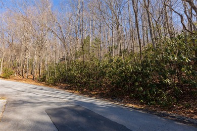 Discover an exceptional opportunity to build your mountain on Sapphire National Golf Club in North Carolina - for sale on GolfHomes.com, golf home, golf lot