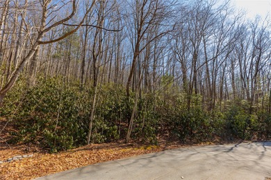Discover an exceptional opportunity to build your mountain on Sapphire National Golf Club in North Carolina - for sale on GolfHomes.com, golf home, golf lot