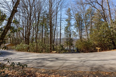 Discover an exceptional opportunity to build your mountain on Sapphire National Golf Club in North Carolina - for sale on GolfHomes.com, golf home, golf lot