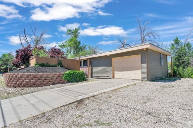 Back on the Market! Large home nestled in the heart of Sandy on Schneiters Pebble Brook Golf Course in Utah - for sale on GolfHomes.com, golf home, golf lot