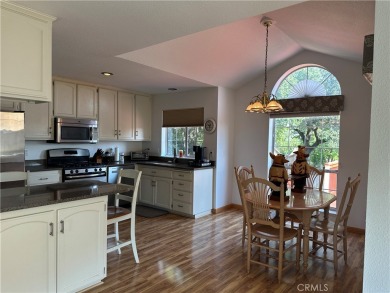 Welcome to this charming and well-kept home nestled in a quiet on Lake Oroville Golf and Event Center in California - for sale on GolfHomes.com, golf home, golf lot