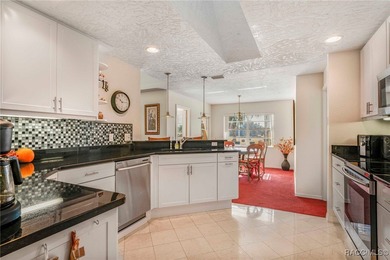 This house has been remodeled to easily accommodate a larger on LakeSide Country Club in Florida - for sale on GolfHomes.com, golf home, golf lot