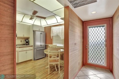 BACK ON THE MARKET!!! PRICE REDUCED AND HOA FEES LOWERED! HUGE on Wynmoor Golf Course in Florida - for sale on GolfHomes.com, golf home, golf lot
