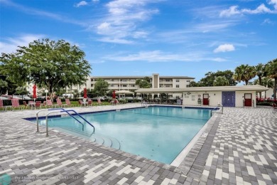 BACK ON THE MARKET!!! PRICE REDUCED AND HOA FEES LOWERED! HUGE on Wynmoor Golf Course in Florida - for sale on GolfHomes.com, golf home, golf lot
