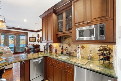 Experience the pinnacle of waterfront living in this on The Cliffs At Keowee Falls in South Carolina - for sale on GolfHomes.com, golf home, golf lot