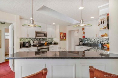 This house has been remodeled to easily accommodate a larger on LakeSide Country Club in Florida - for sale on GolfHomes.com, golf home, golf lot