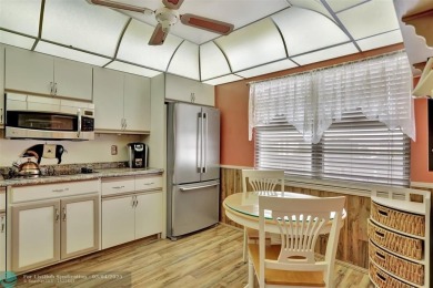 BACK ON THE MARKET!!! PRICE REDUCED AND HOA FEES LOWERED! HUGE on Wynmoor Golf Course in Florida - for sale on GolfHomes.com, golf home, golf lot